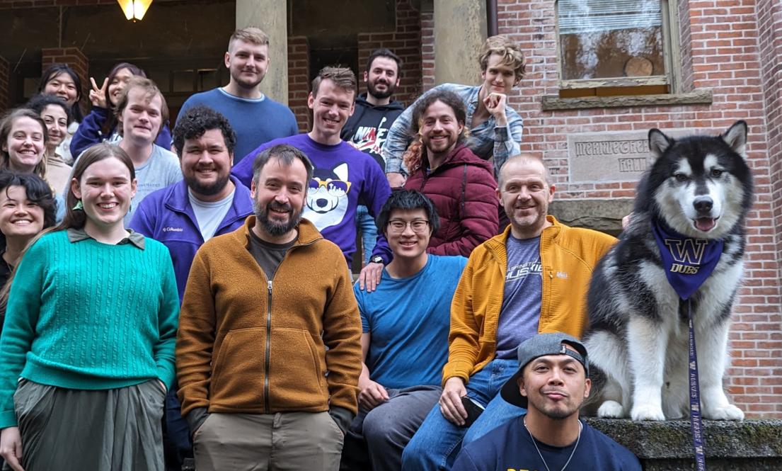 applied math students posing with the dubs the dog